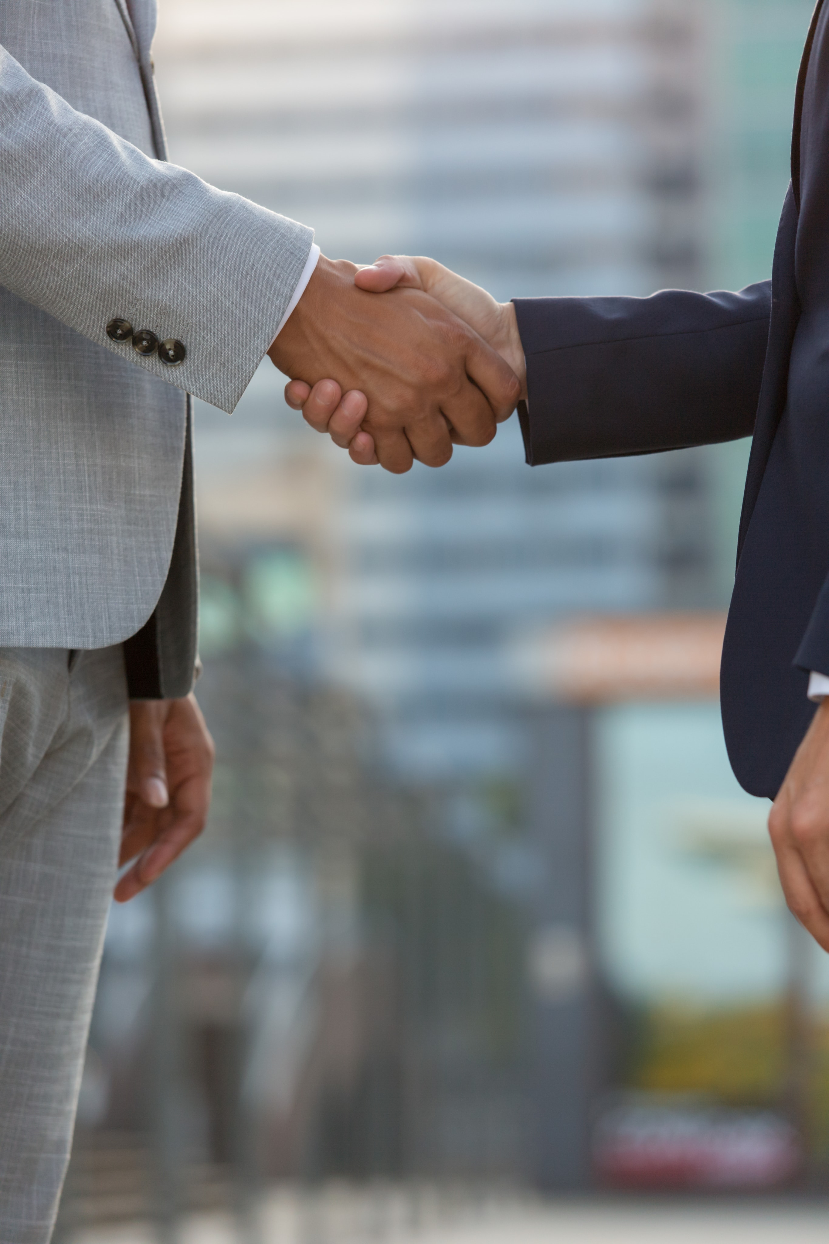 Handshake confirming a booking